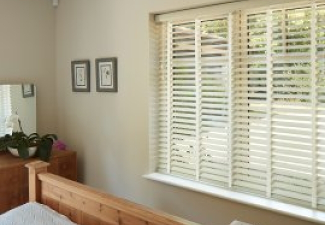 Faux Wood Venetian blinds in a bedroom