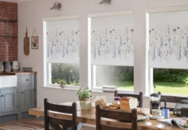 White roller blinds in a dining room