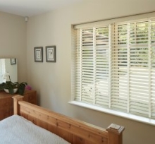 Faux Wood Venetian blinds in a bedroom